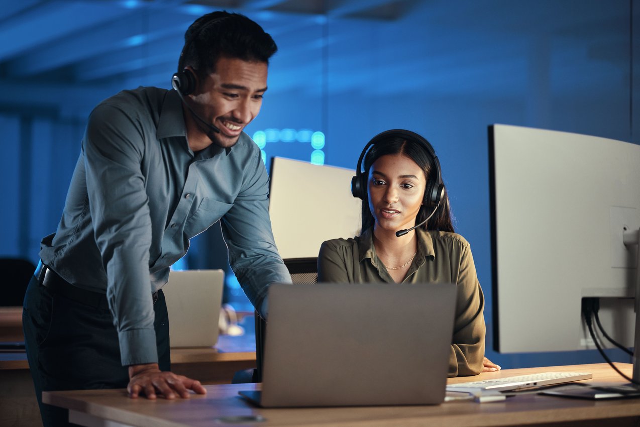 businessman-call-center-and-coaching-on-laptop